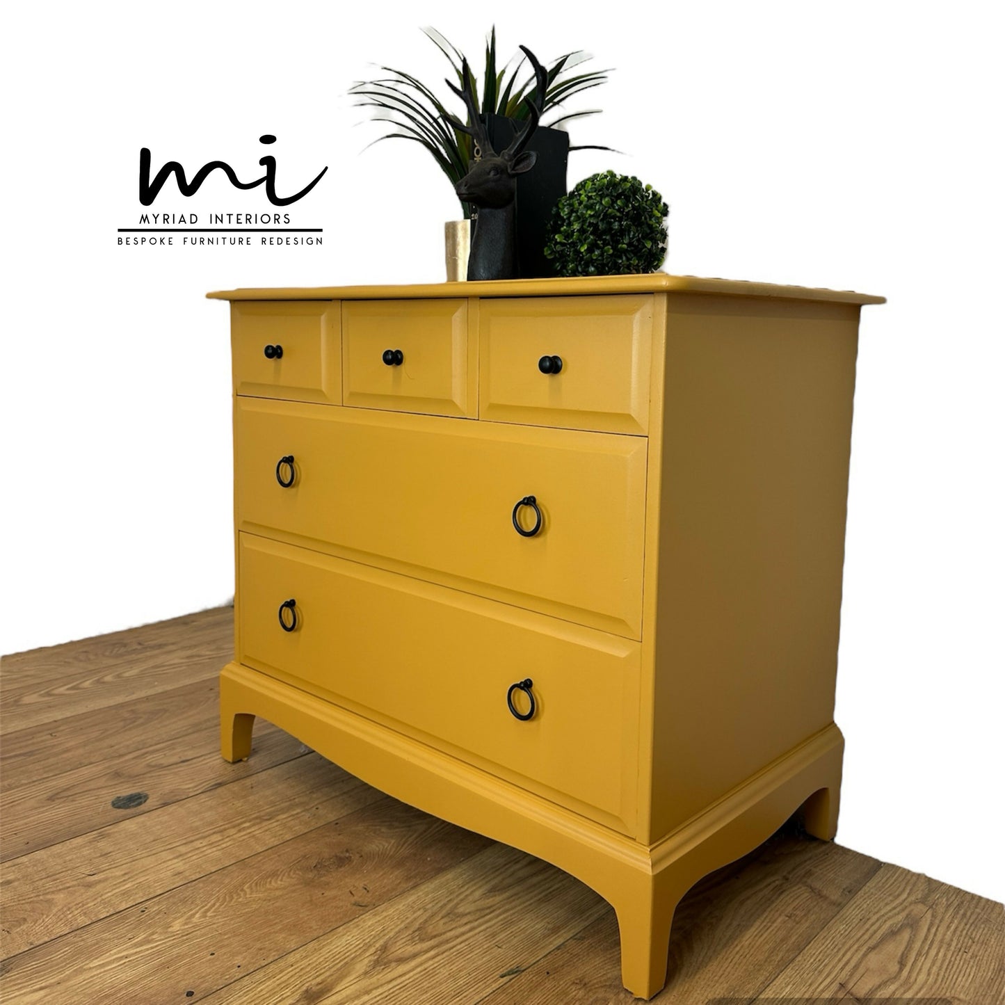 Stag Minstrel Chest Of Drawers in mustard yellow, oversized bedside table, dresser, mid century, 5 drawer, maximalist, bold black, sideboard