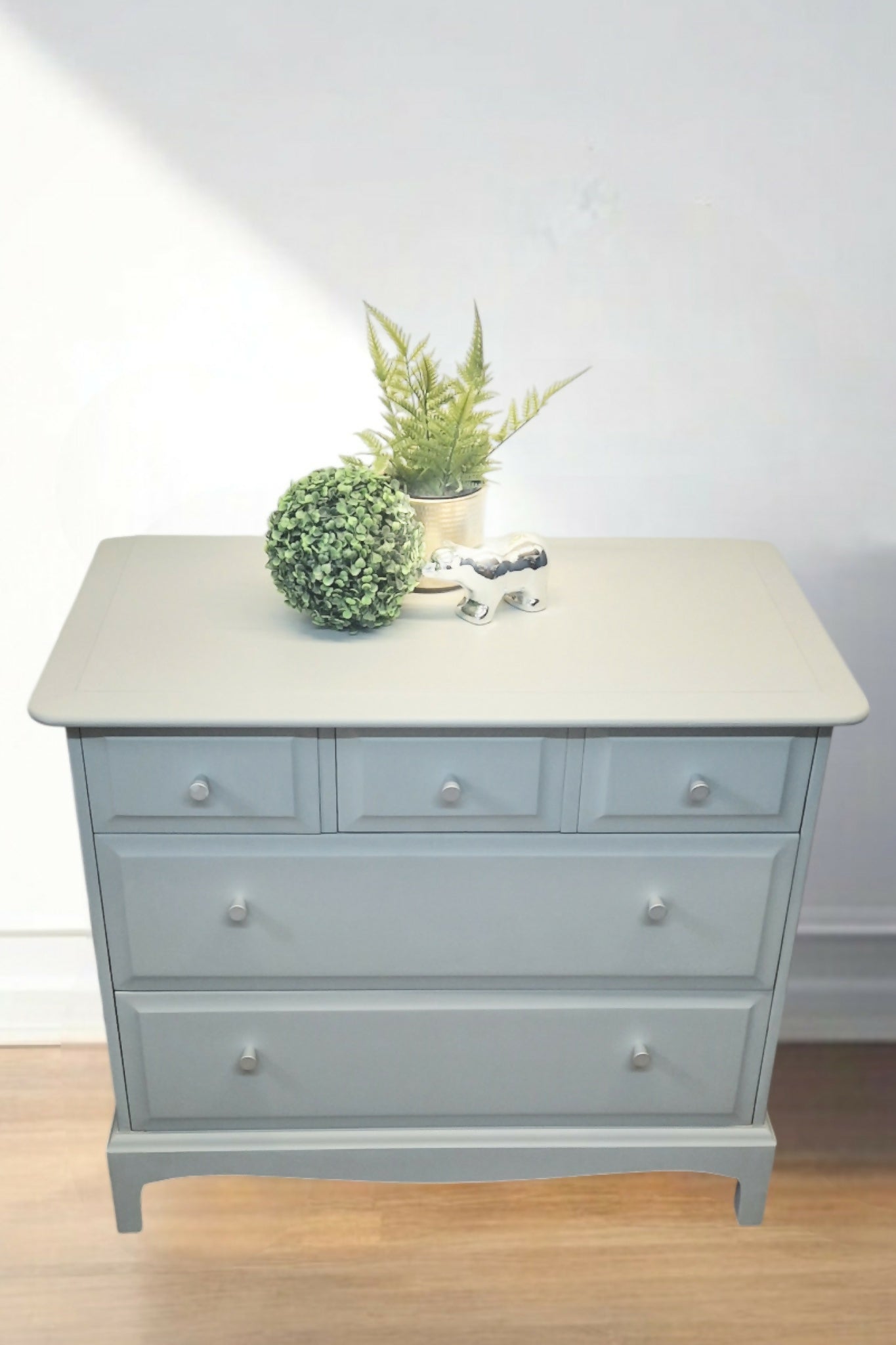 Stag Minstrel Chest of Drawers on Grey, Oversize bedside table
