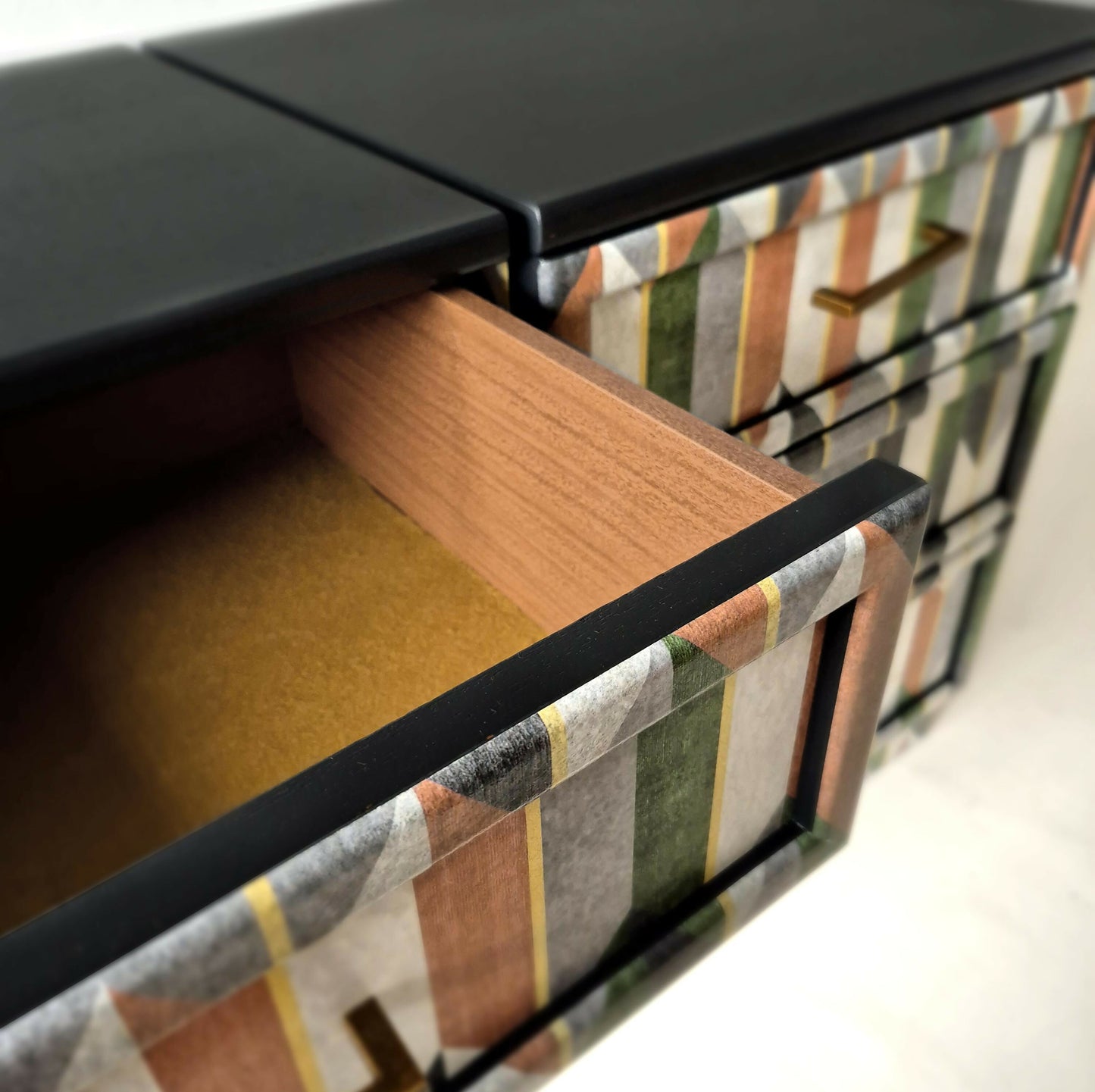 bedside table drawer with mustard yeallow fabric inlay