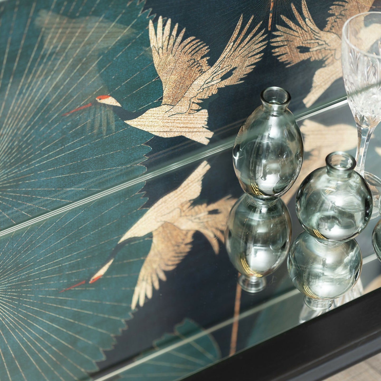Exquisite Art Deco drinks cabinet decoupaged in a striking blend of emerald, subtle gold and black crane fabric. Sold, commission available.