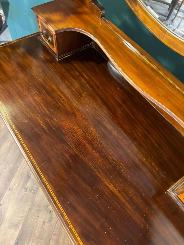 Edwardian mahogany inlaid dressing table featuringn