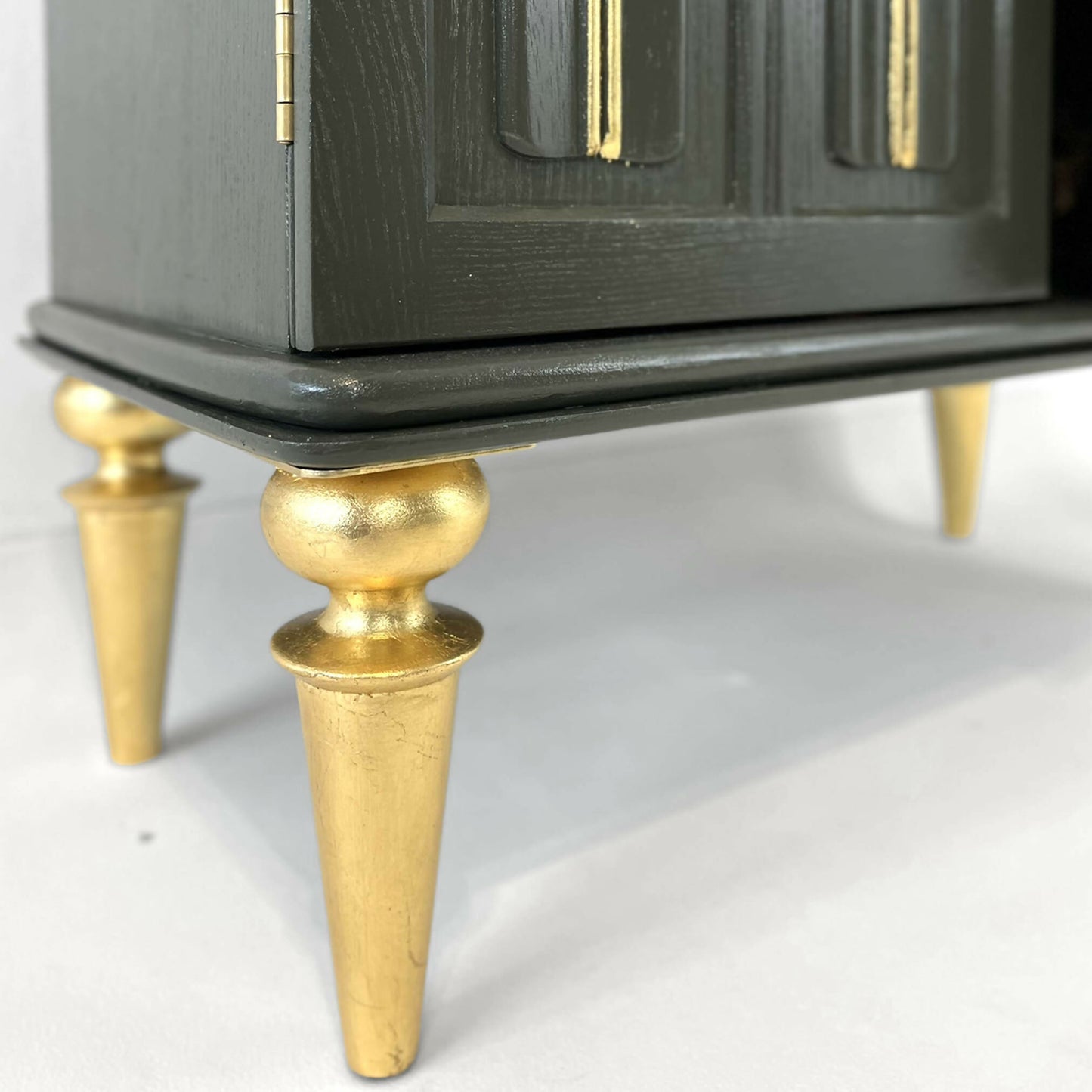 Painted green antique drinks cabinet with gold guilded legs