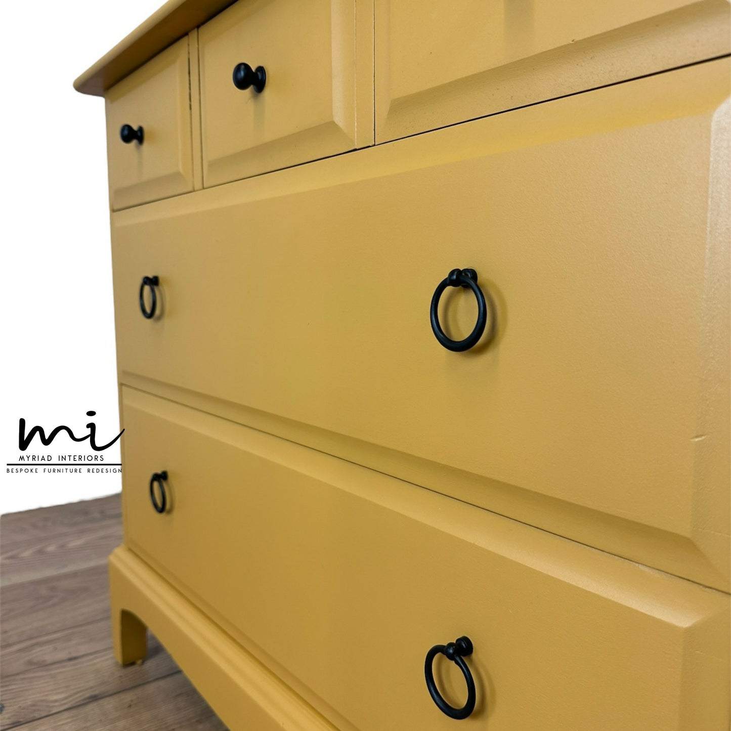 Stag Minstrel Chest Of Drawers in mustard yellow, oversized bedside table, dresser, mid century, 5 drawer, maximalist, bold black, sideboard