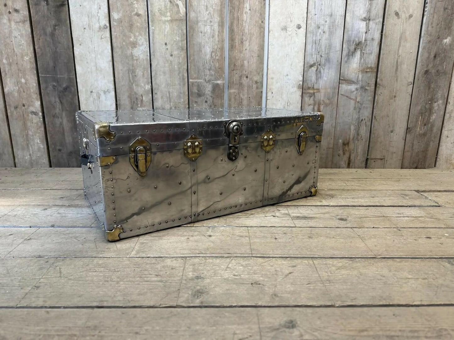 Aluminium and brass vintage travel trunk