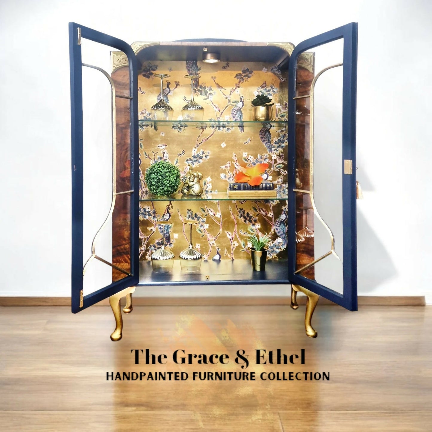 art deco peacock navy and gold glass cabinet