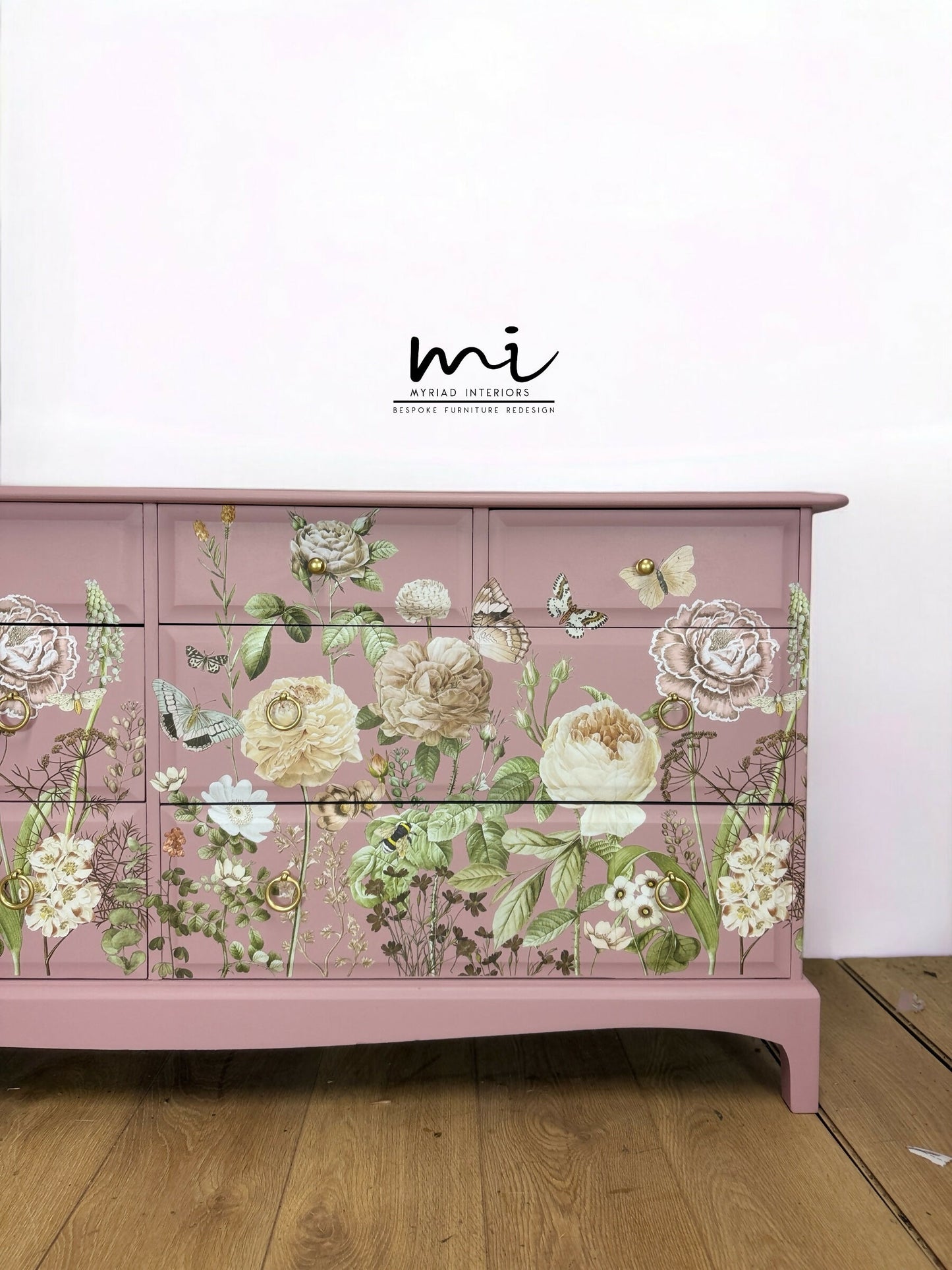 Refinished Stag Minstrel Captains Chest Of Drawers In Dusky Pink With Floral Design, large drawers, sideboard