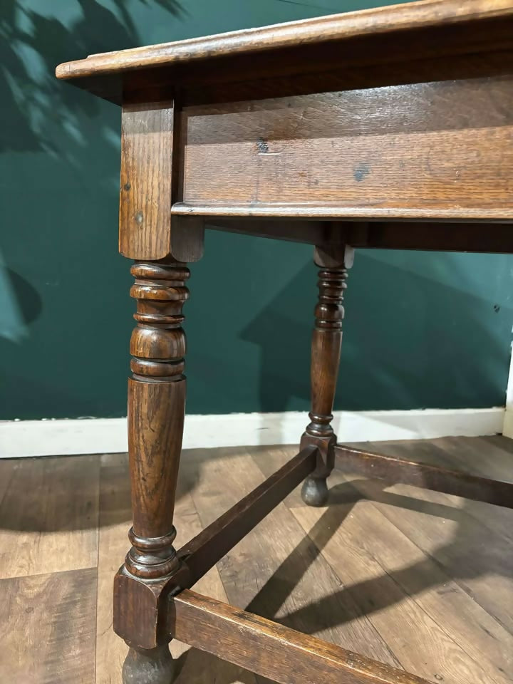 Victorian oak library table featuring vv