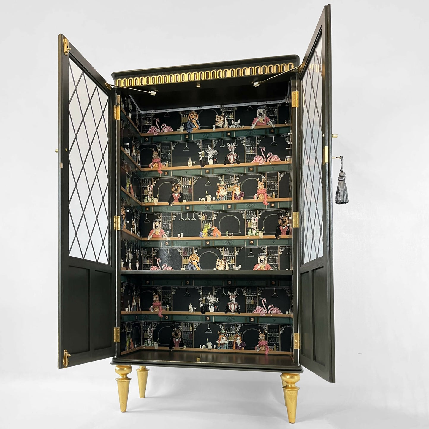Painted green antique drinks cabinet with animals in the bar and glass door and gold legs - Copy