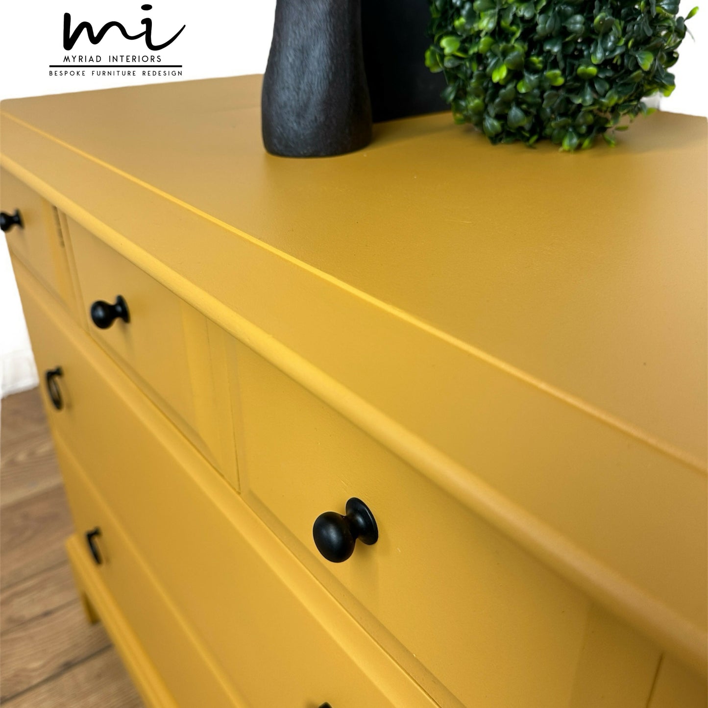Stag Minstrel Chest Of Drawers in mustard yellow, oversized bedside table, dresser, mid century, 5 drawer, maximalist, bold black, sideboard