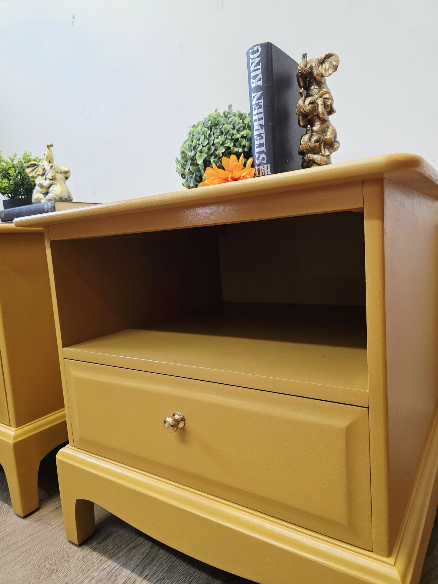 mustard yellow stag minstrel bedside cabinets