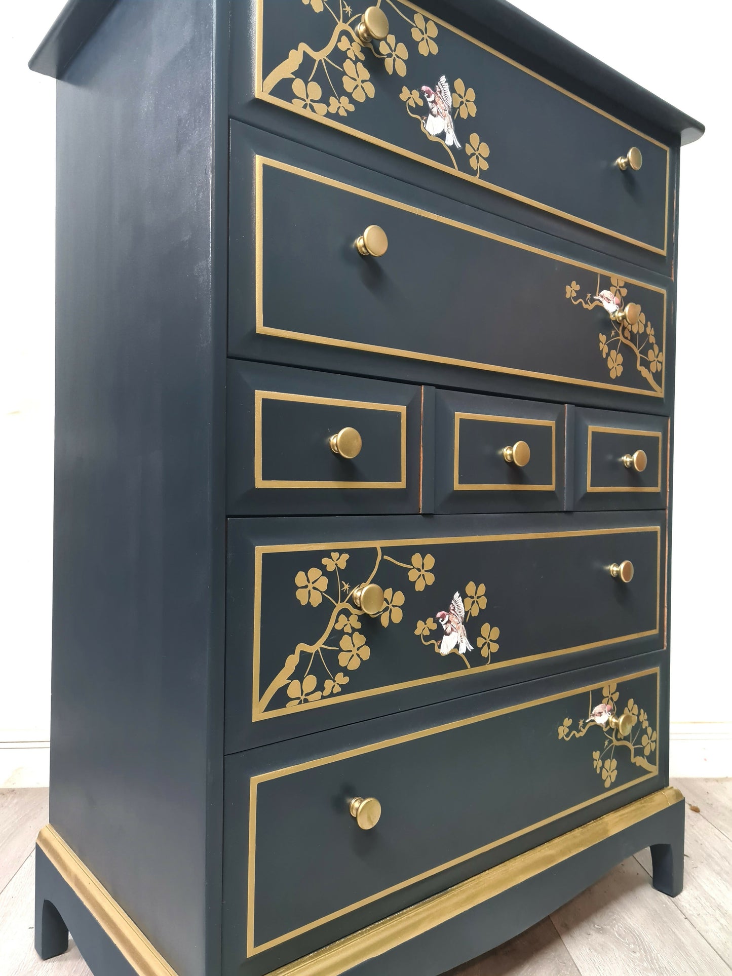 Nay and gold stag minstrel tall boy chest of drawers