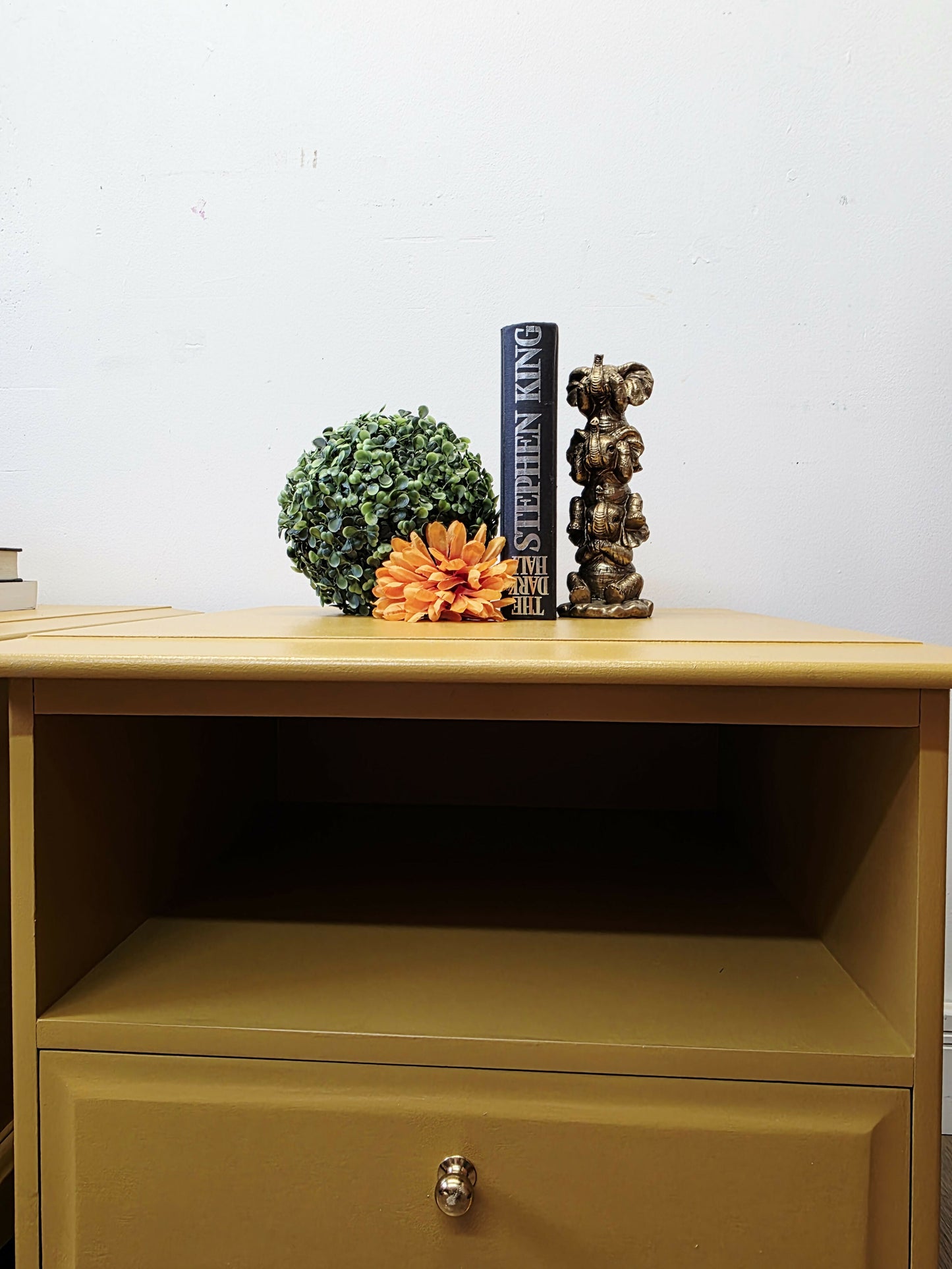 mustard yellow stag minstrel bedside cabinets