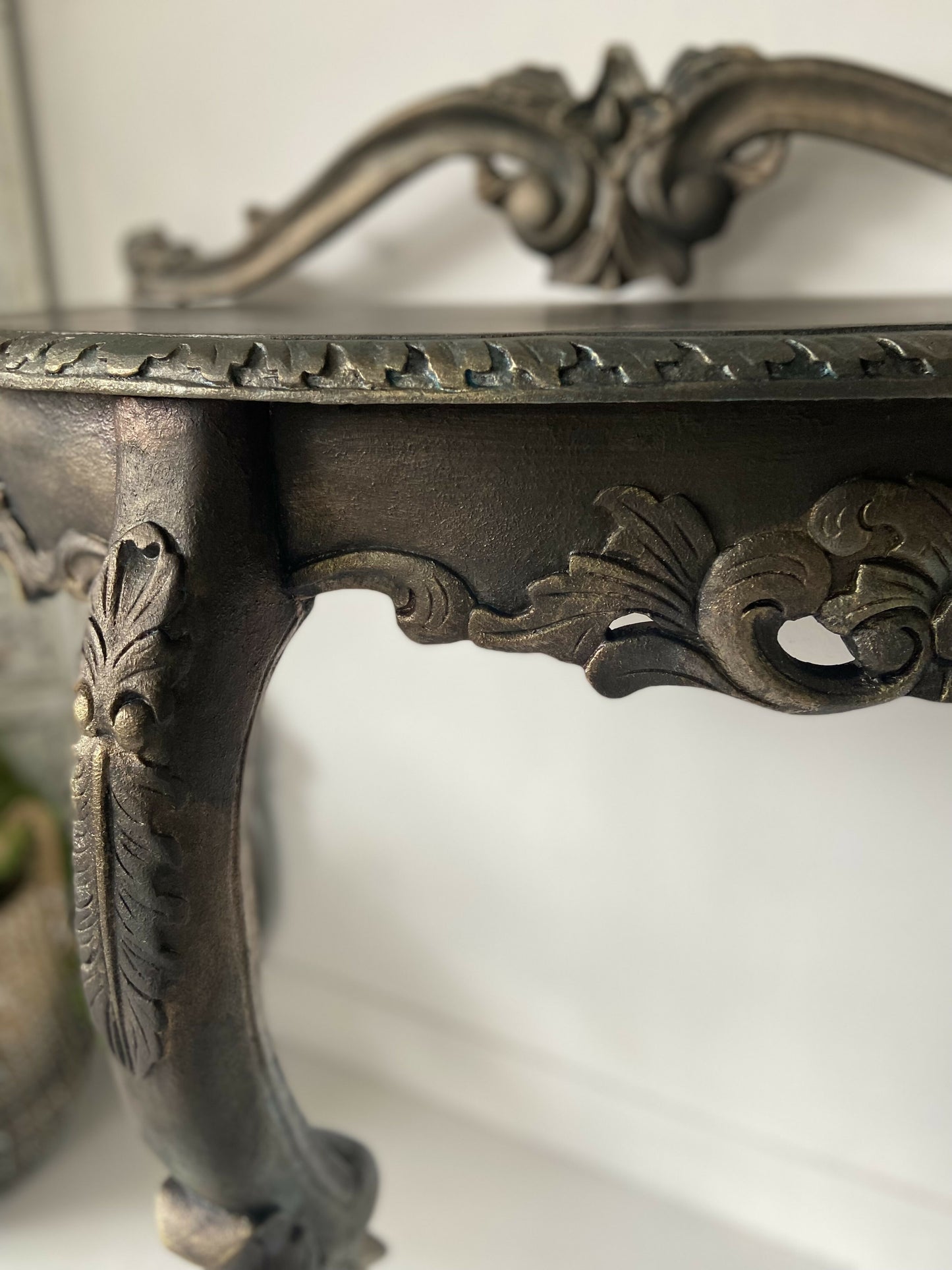 Carved console table bronze