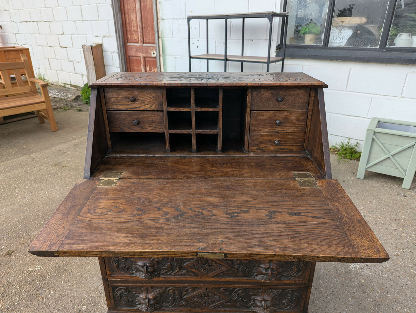 Antique Victorian tudor oak hand carved green man bureau dest chest drawers in