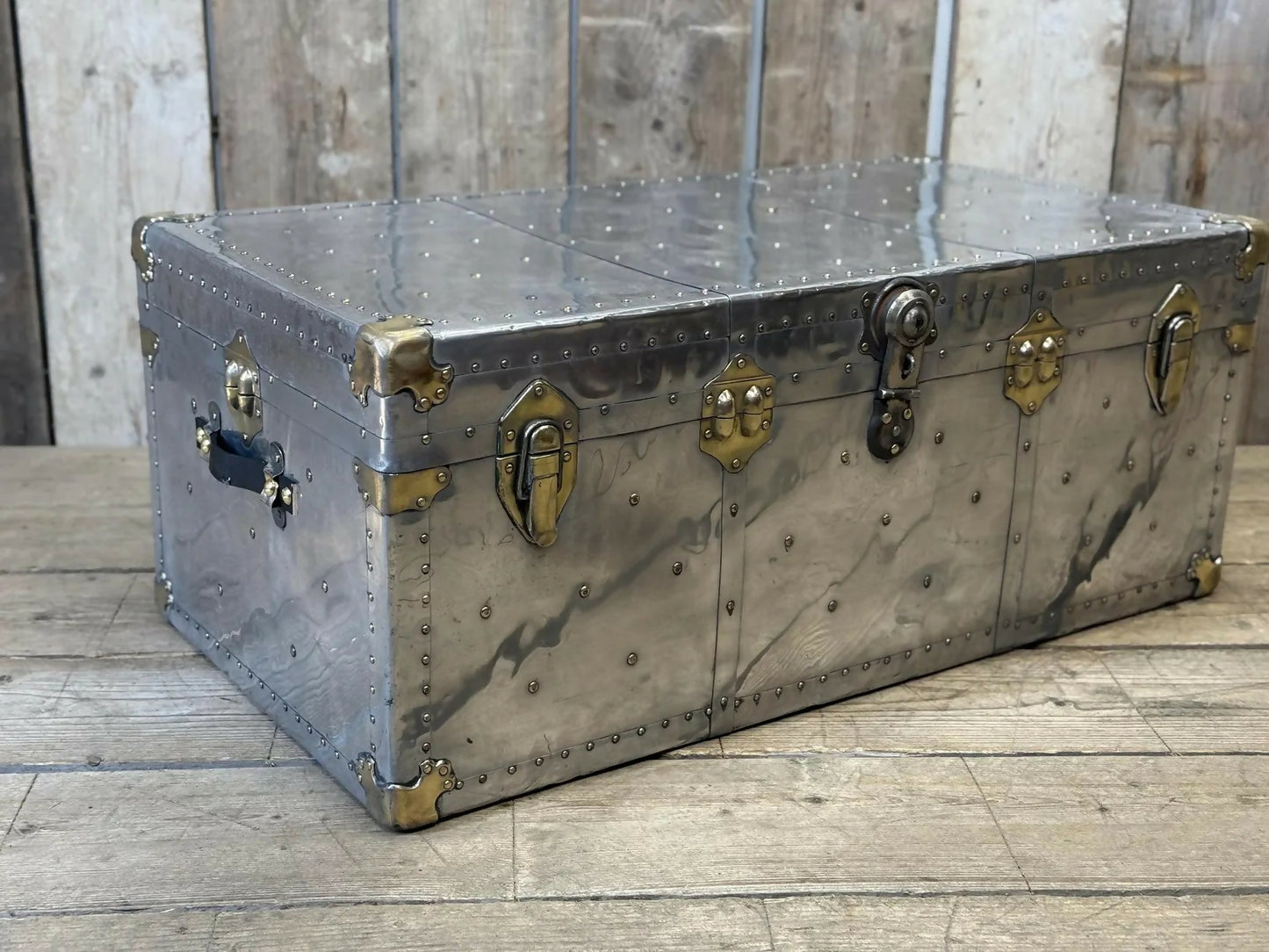 Aluminium and brass vintage travel trunk