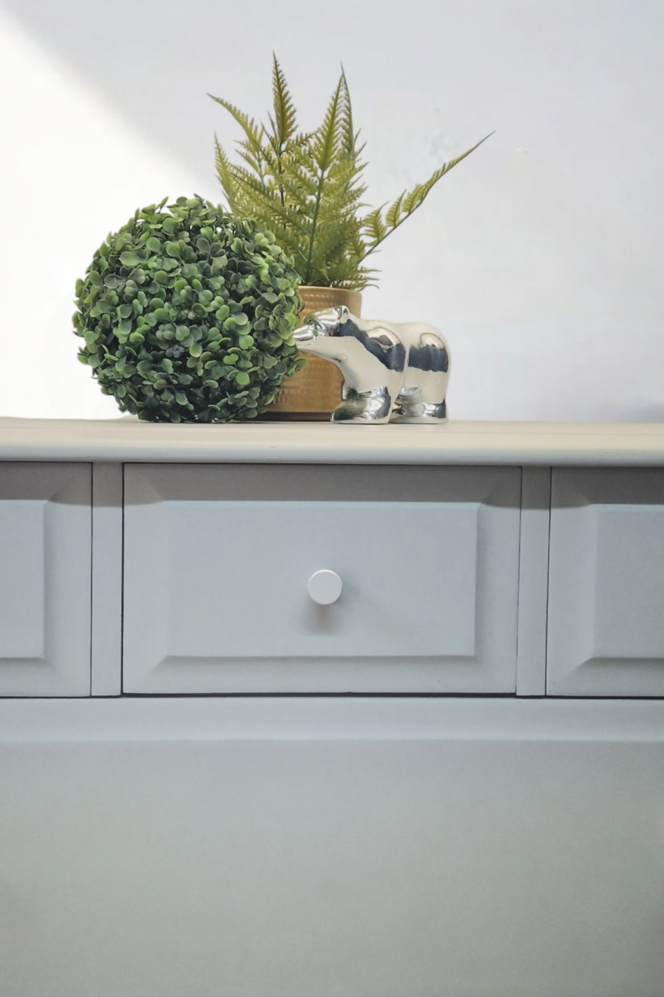 Stag Minstrel Chest of Drawers on Grey, Oversize bedside table