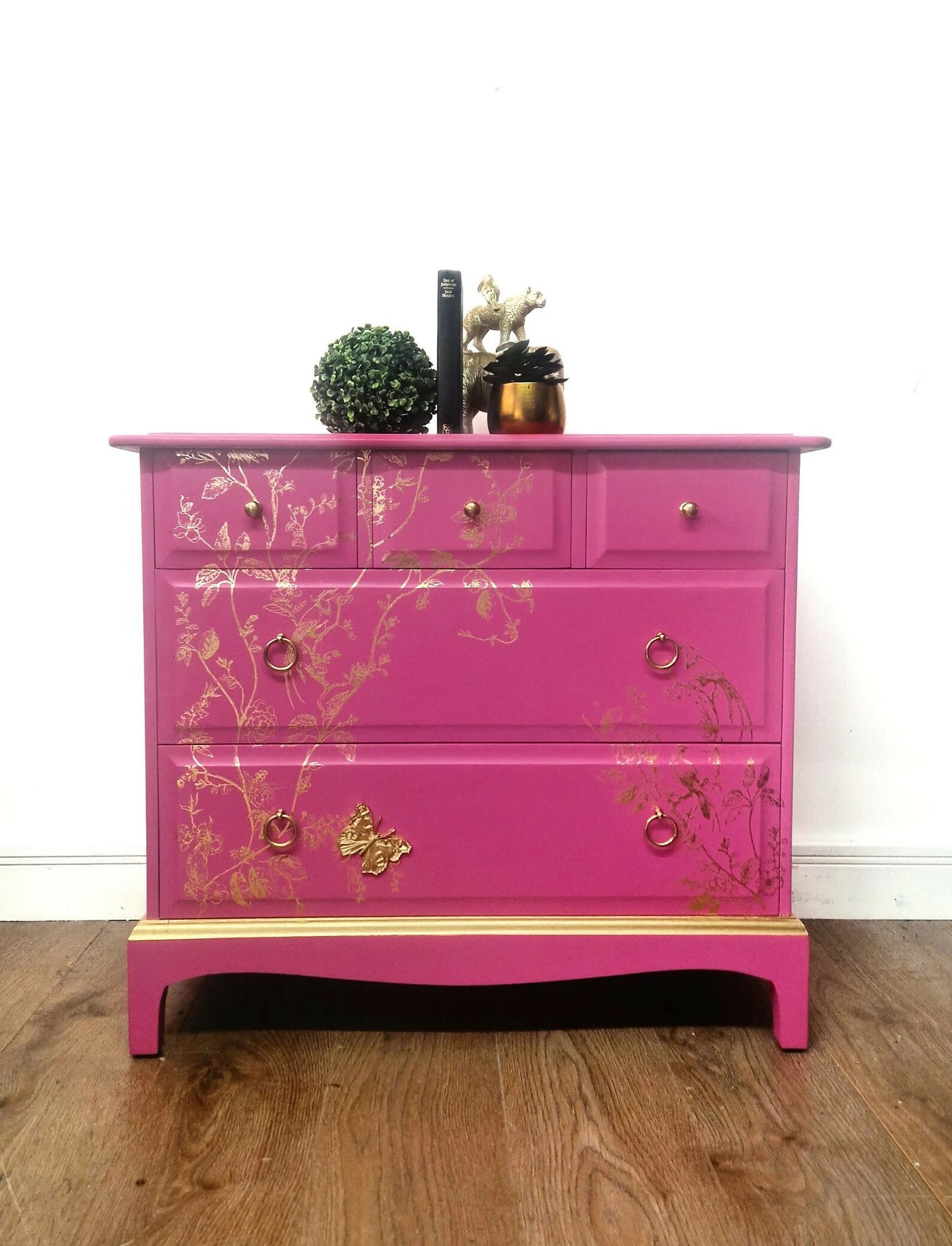 Stag chest of drawers in hot pink and gold