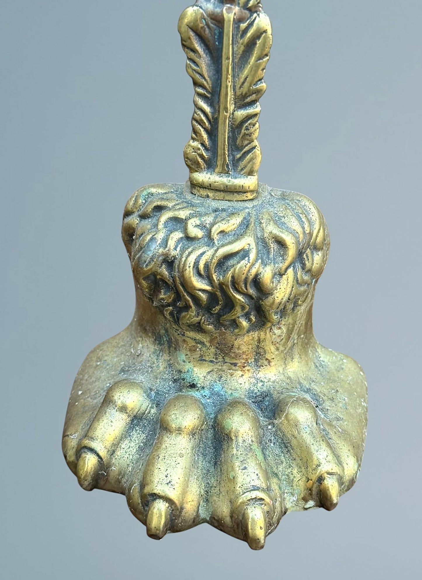 A Near Pair of 19th Century Brass Lion Paw Door Porters