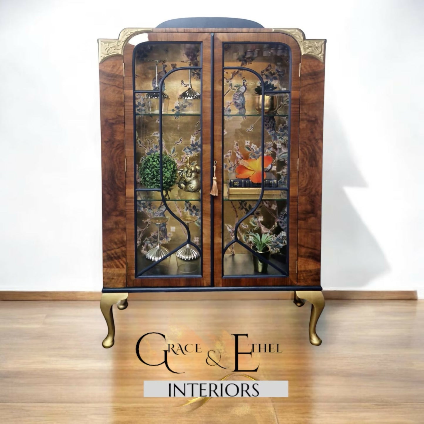 art deco peacock navy and gold glass cabinet