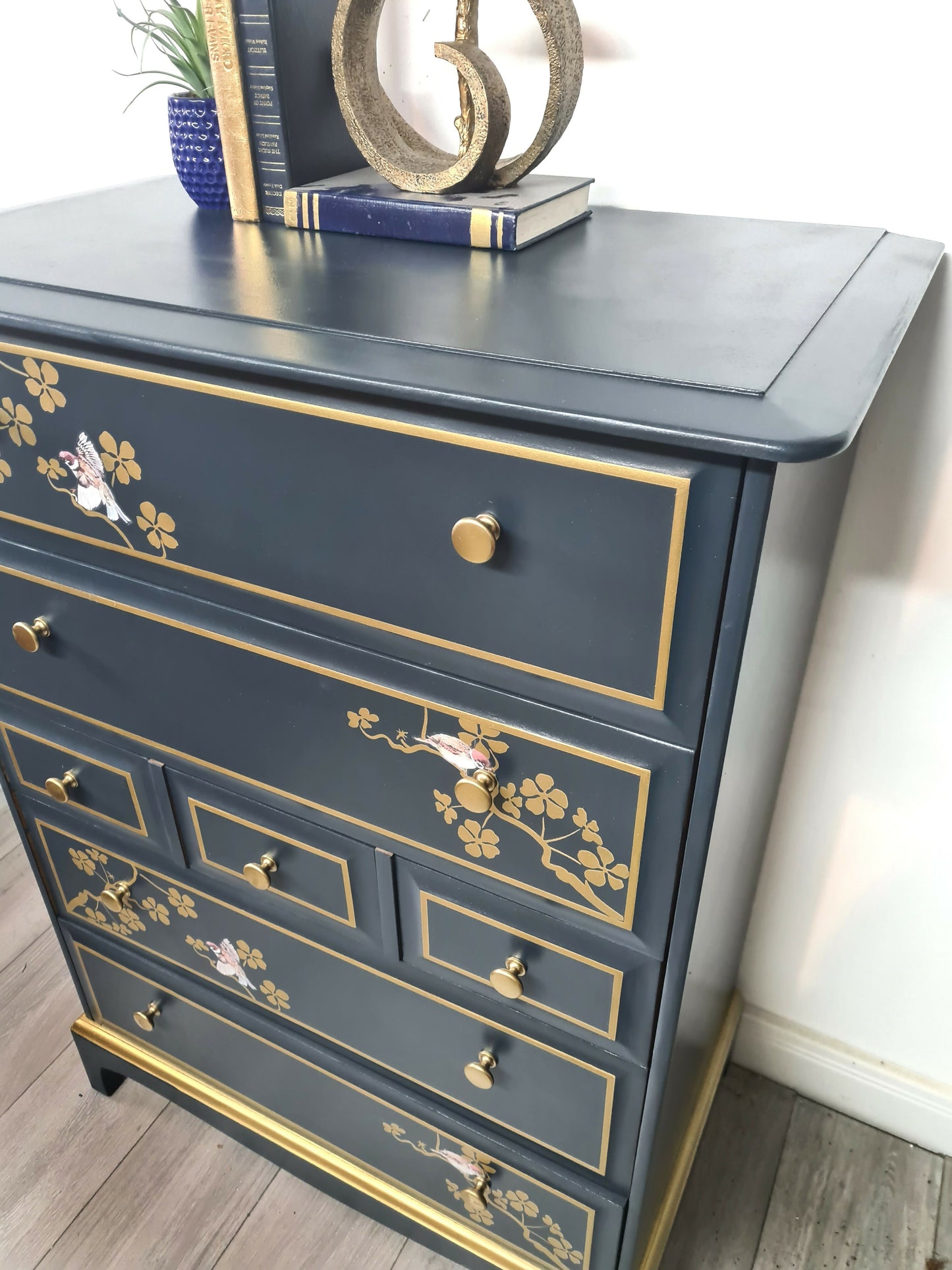 Nay and gold stag minstrel tall boy chest of drawers