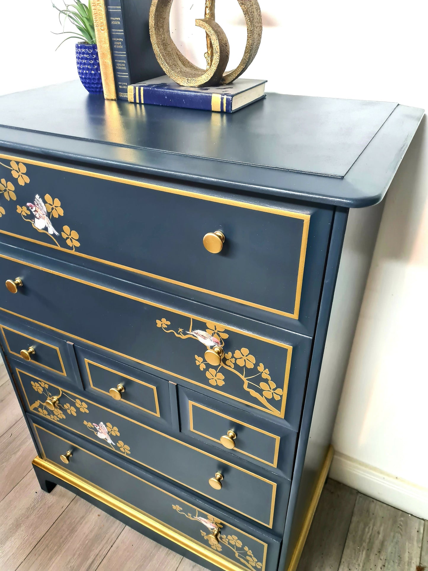 Nay and gold stag minstrel tall boy chest of drawers