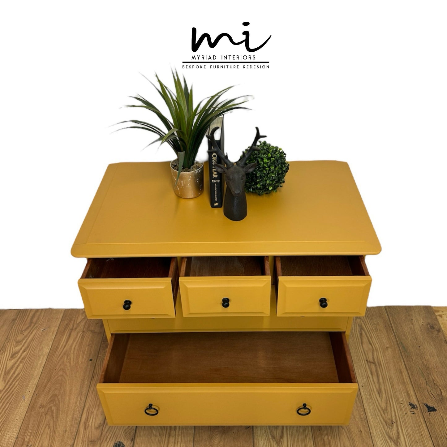 Stag Minstrel Chest Of Drawers in mustard yellow, oversized bedside table, dresser, mid century, 5 drawer, maximalist, bold black, sideboard