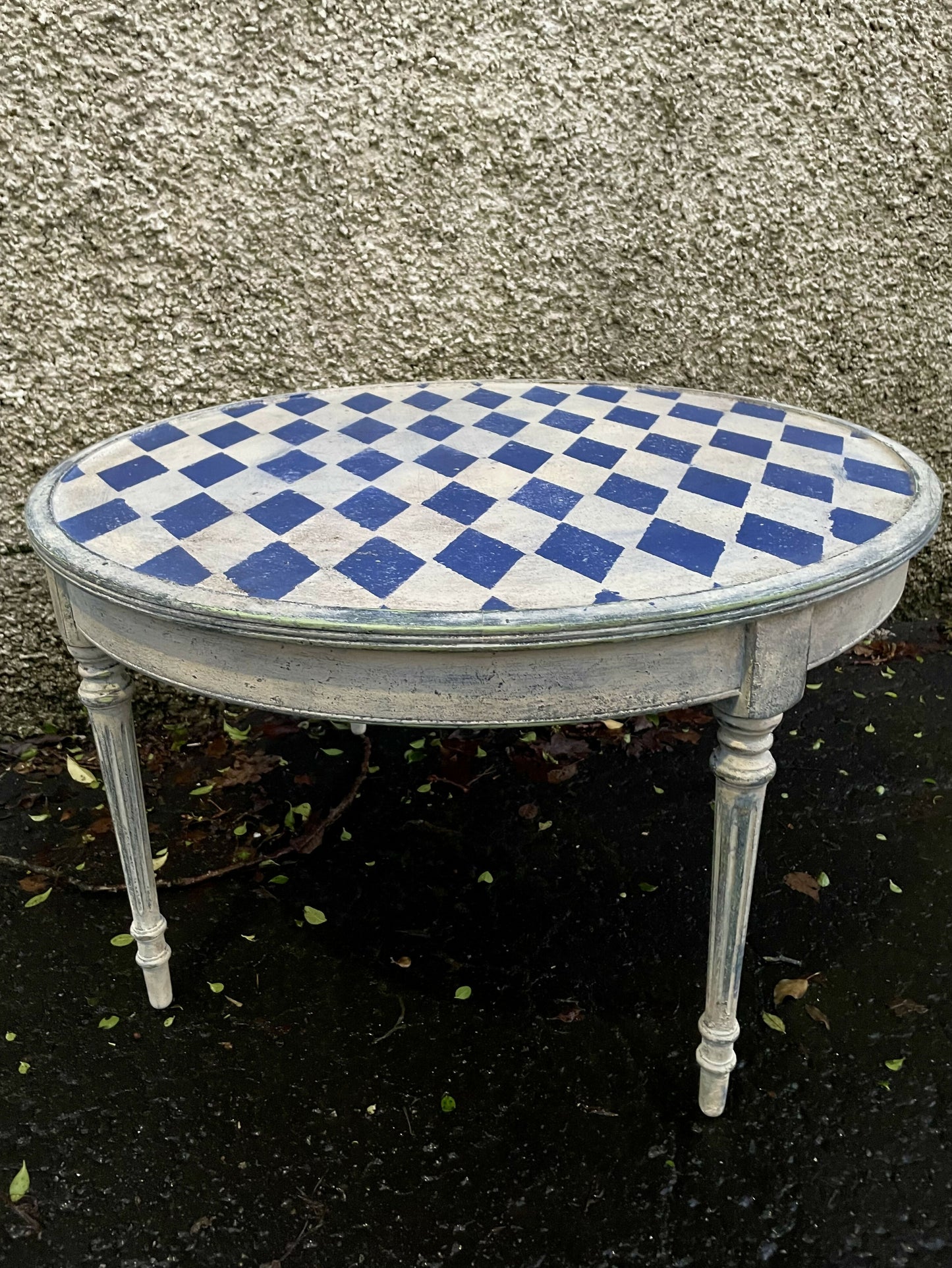 Vintage coffee table painted in a textured patina with french diamond stencil design.