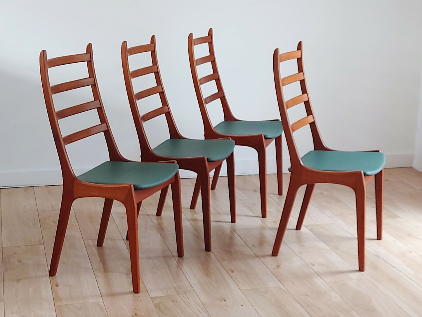 Mid century leather Danish dining chairs by Kai Kristiansen set of 4
