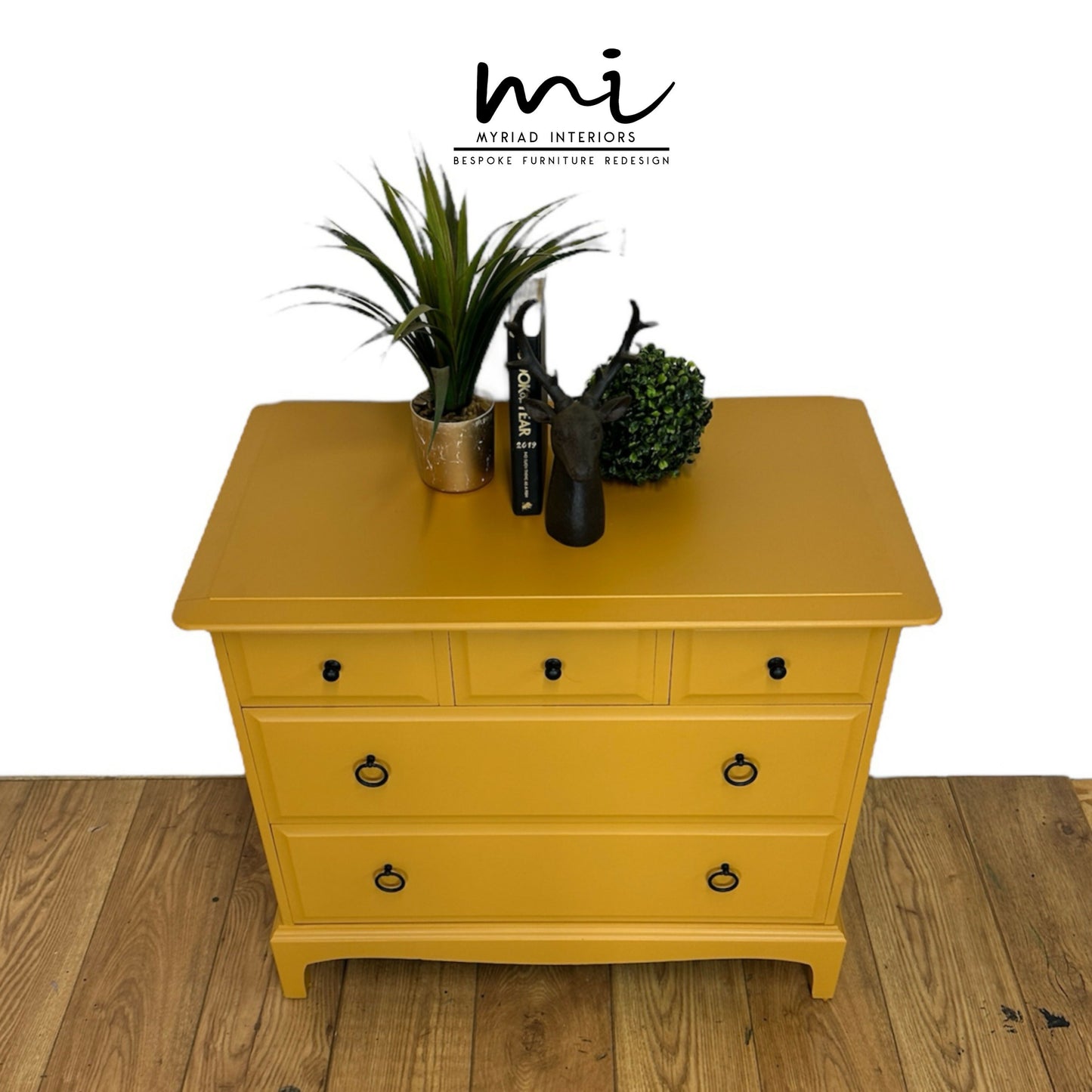 Stag Minstrel Chest Of Drawers in mustard yellow, oversized bedside table, dresser, mid century, 5 drawer, maximalist, bold black, sideboard