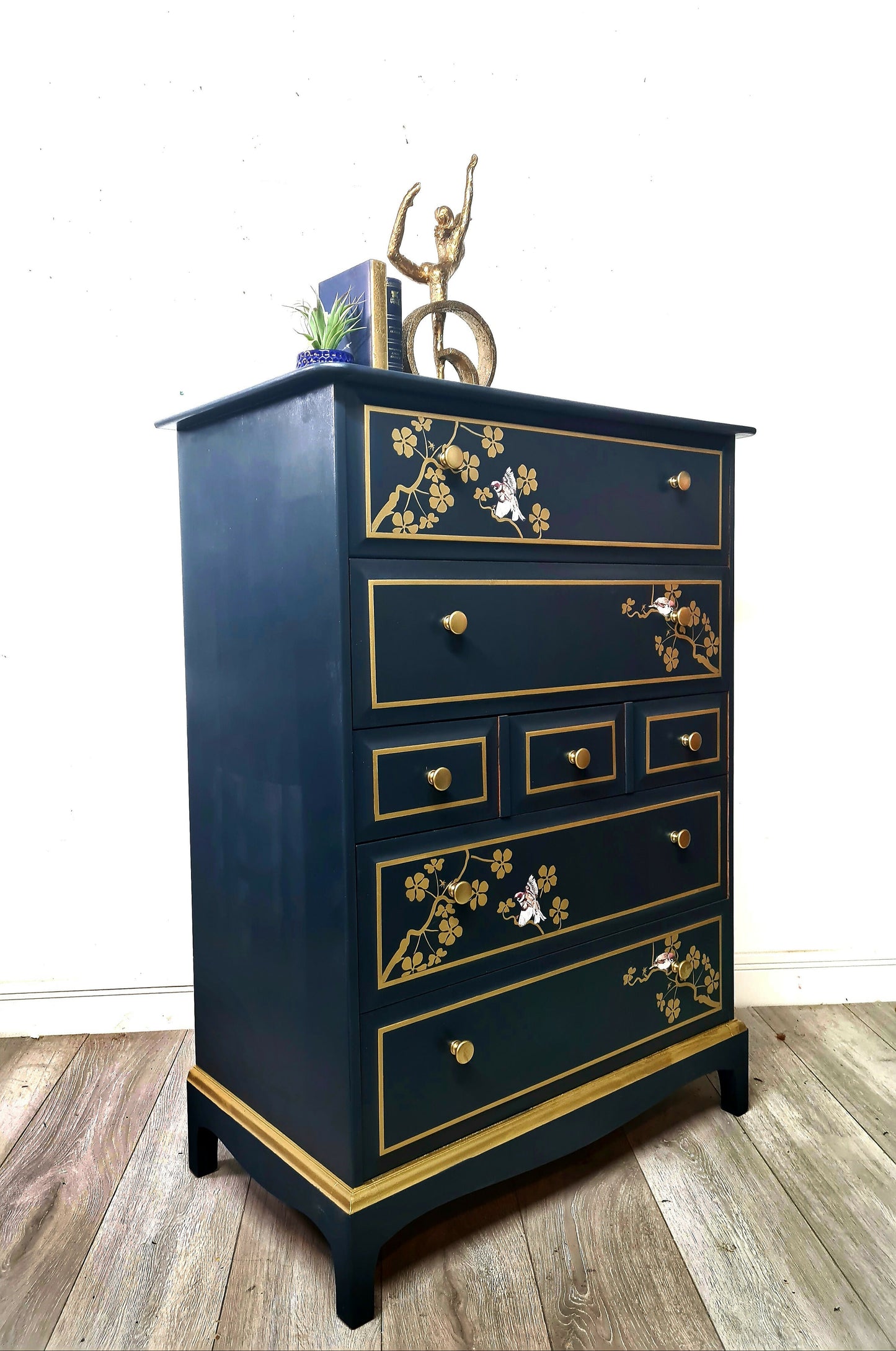 Nay and gold stag minstrel tall boy chest of drawers