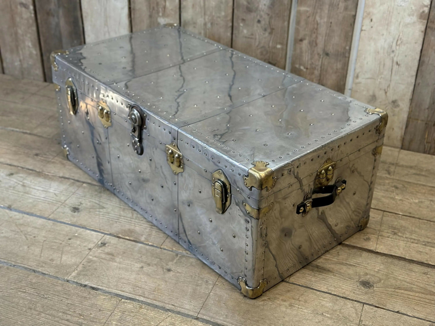 Aluminium and brass vintage travel trunk