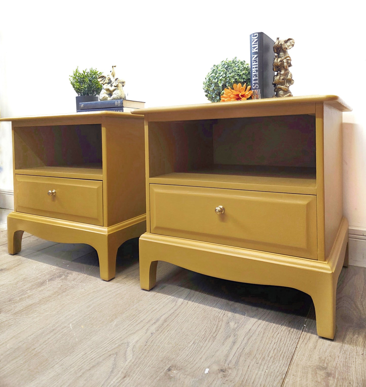 mustard yellow stag minstrel bedside cabinets