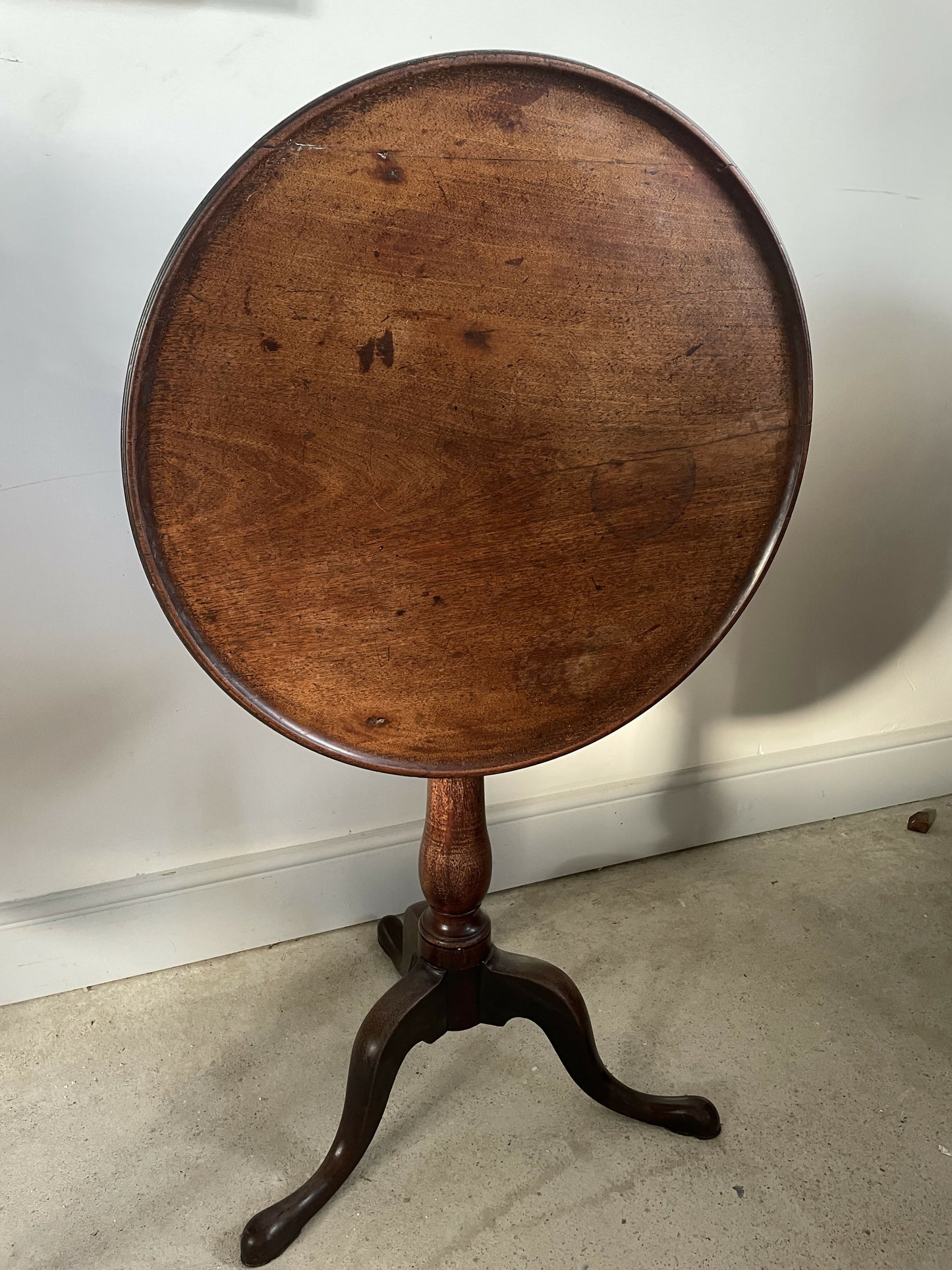 A Georgian antique oak tripod table