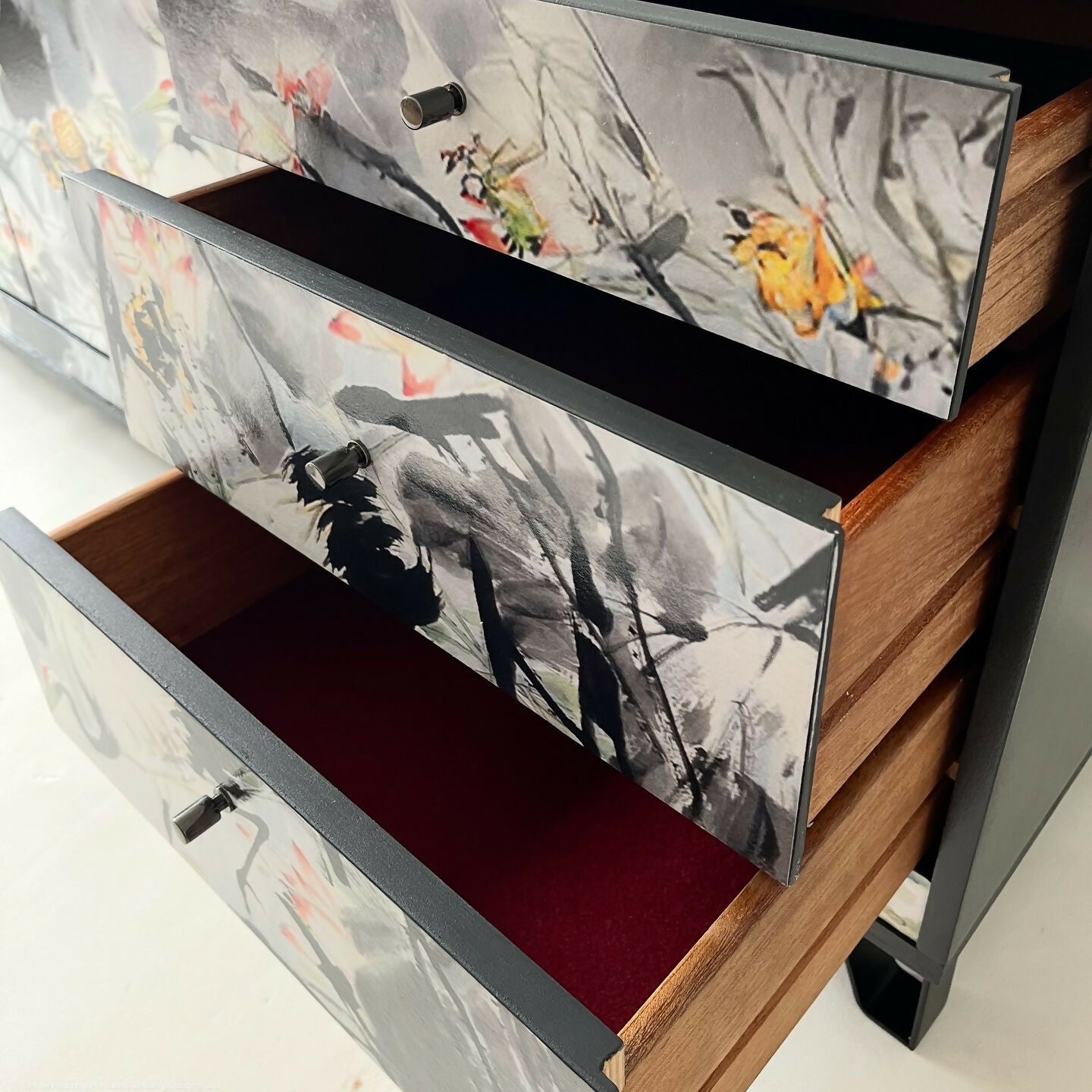 Vintage drawers painted grey and decorated with japanese ink birds ant flowers