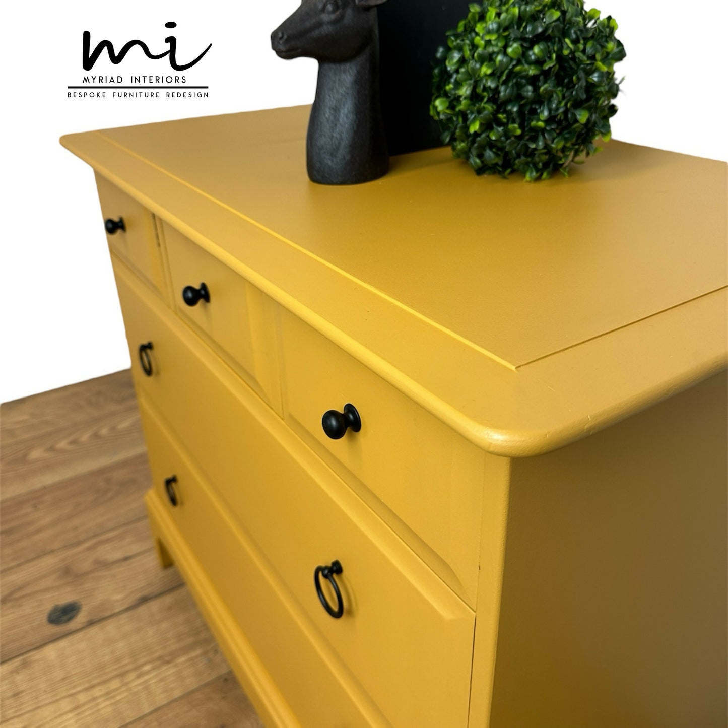 Stag Minstrel Chest Of Drawers in mustard yellow, oversized bedside table, dresser, mid century, 5 drawer, maximalist, bold black, sideboard