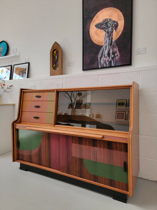 Orange Otter teak sideboard in gallery