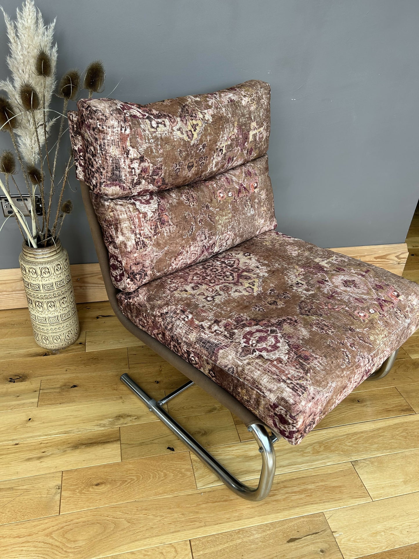 Mid Century 1970s vintage chrome lounge chair with new cushions and upholstery