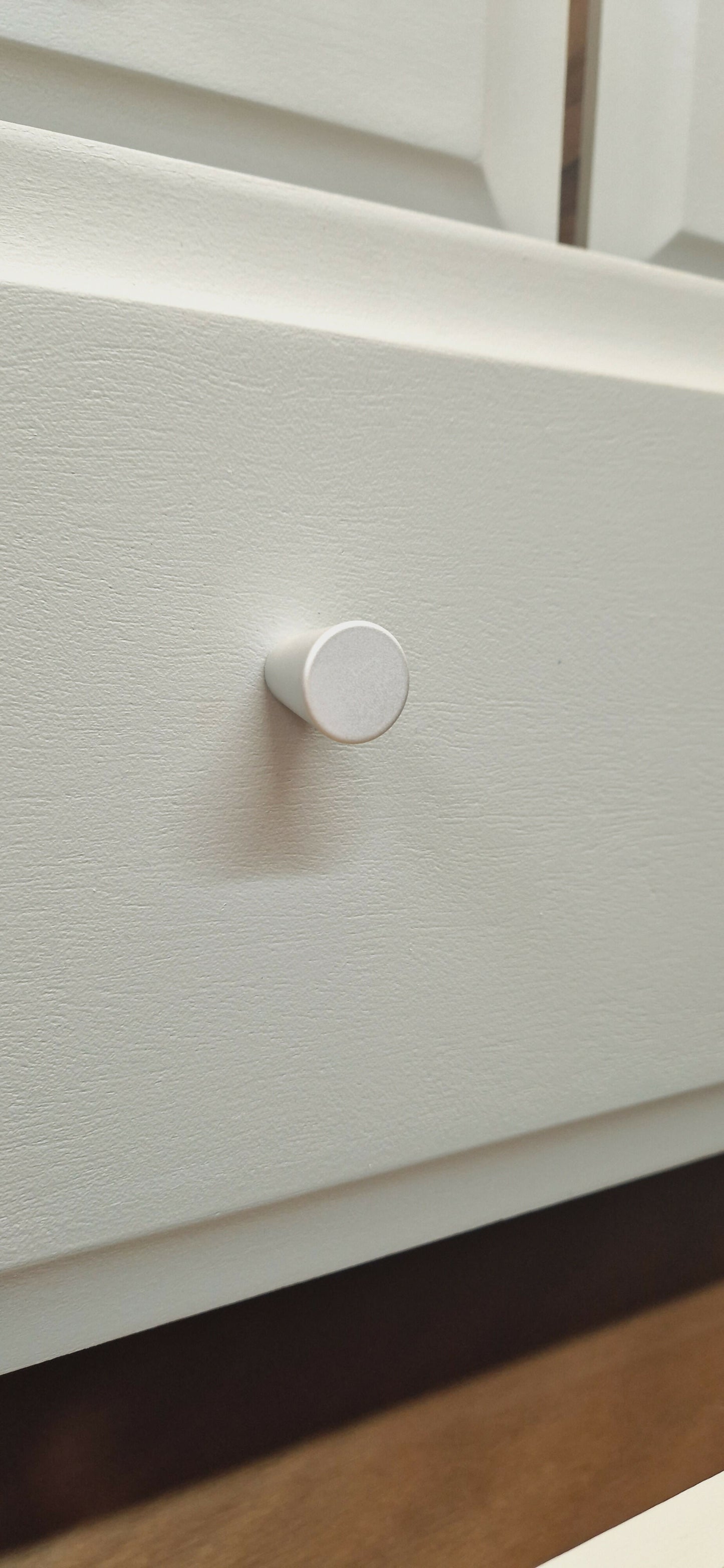 Stag Minstrel Chest of Drawers on Grey, Oversize bedside table