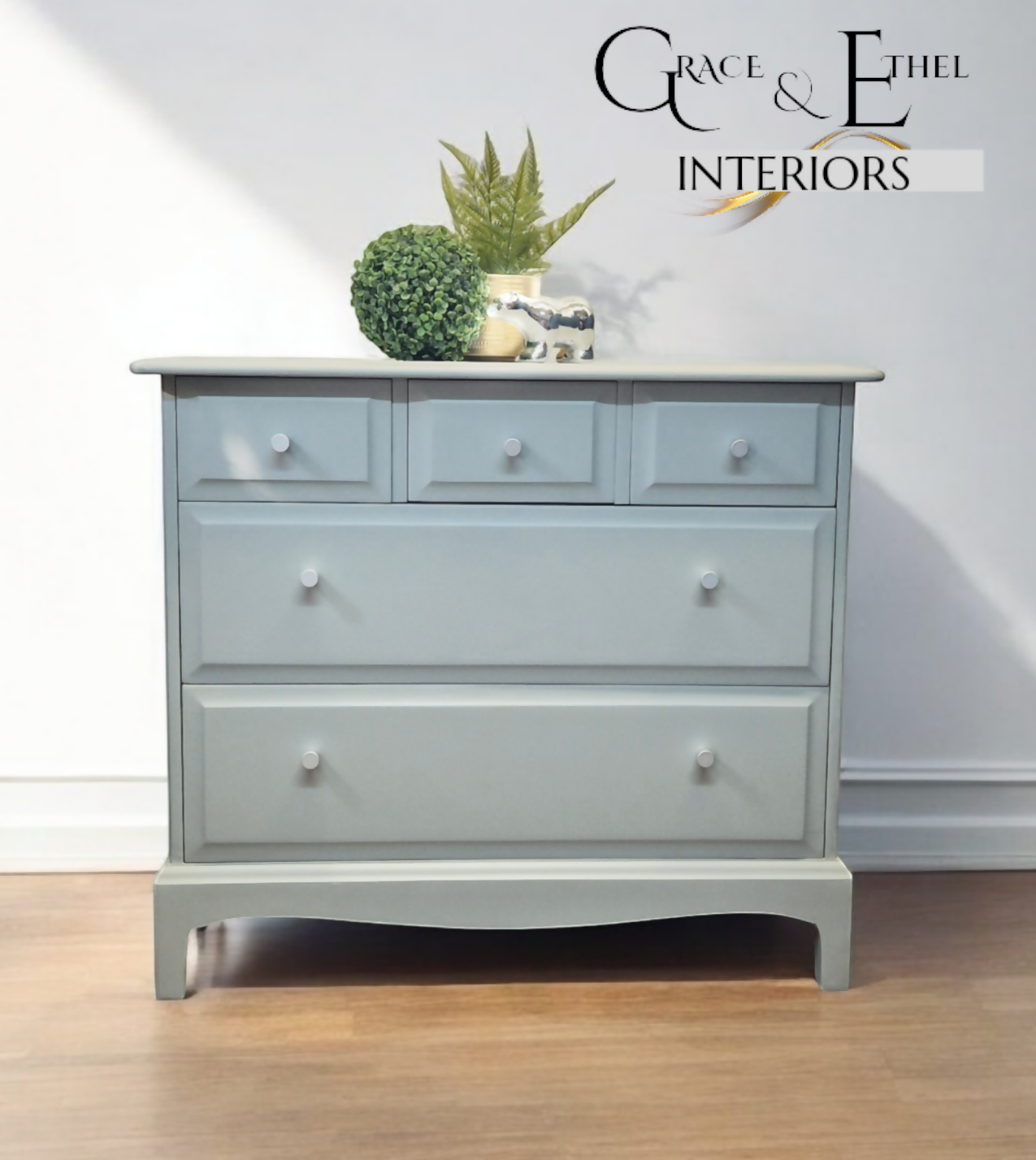 Stag Minstrel Chest of Drawers on Grey, Oversize bedside table
