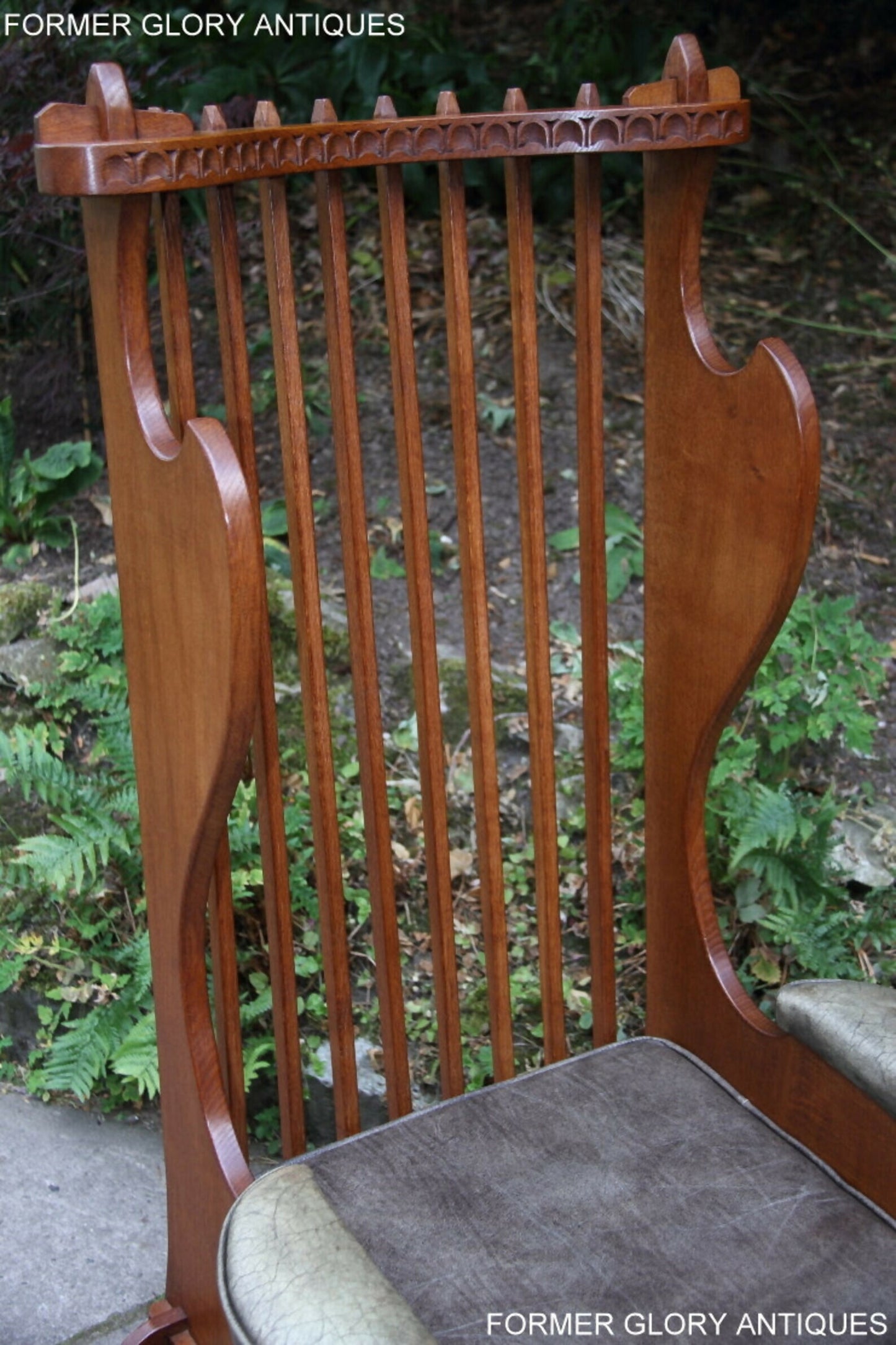 A RUPERT / NIGEL GRIFFITHS CARVED OAK DERBYSHIRE WING BACK LEATHER / ARMCHAIR