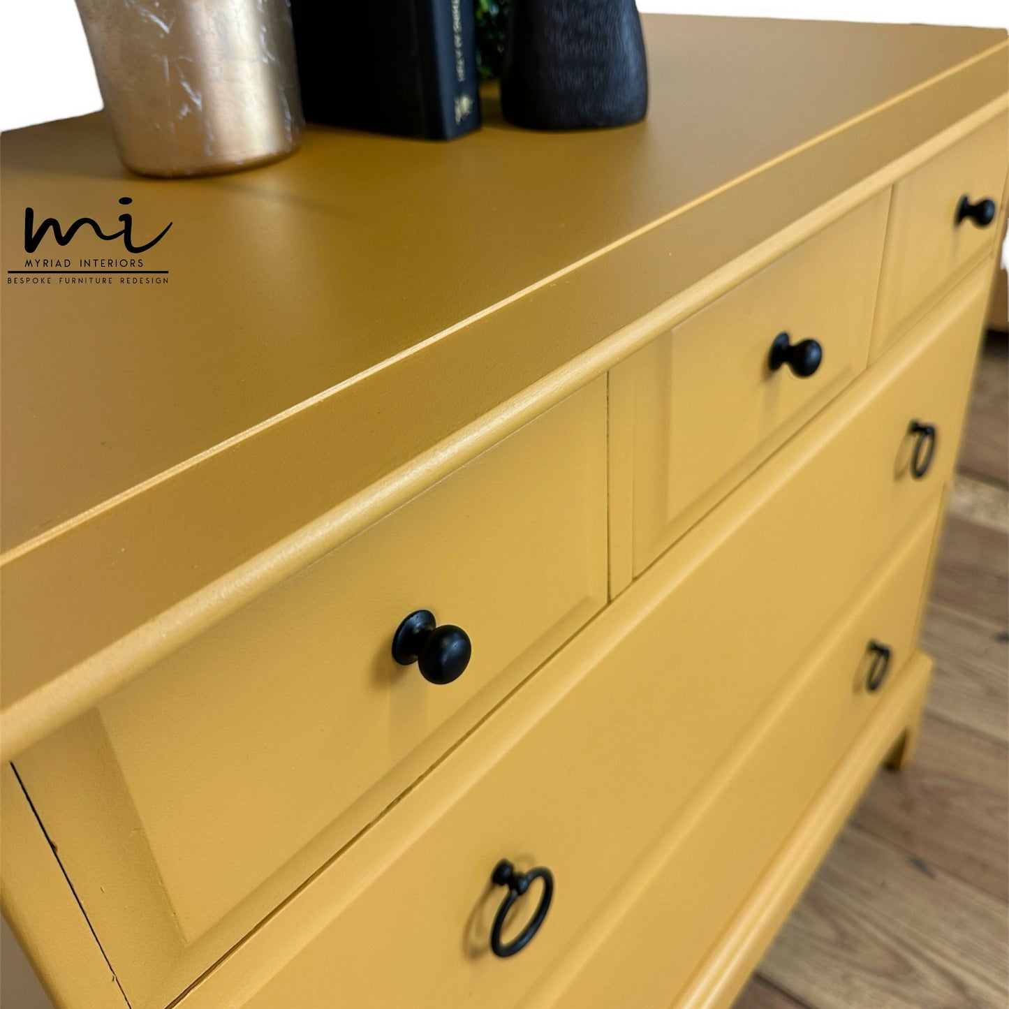 Stag Minstrel Chest Of Drawers in mustard yellow, oversized bedside table, dresser, mid century, 5 drawer, maximalist, bold black, sideboard