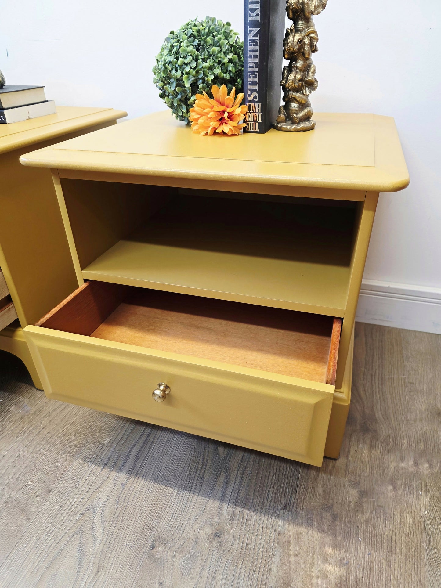 mustard yellow stag minstrel bedside cabinets