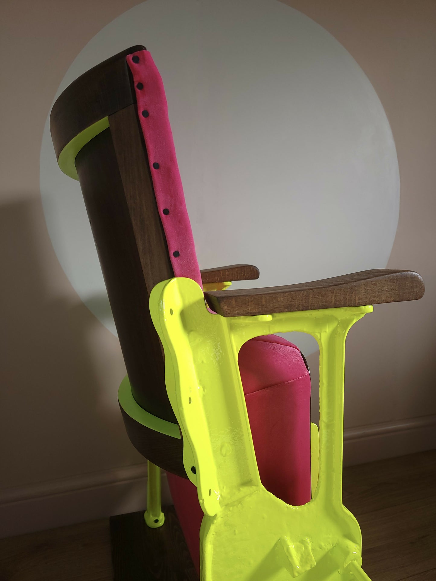 Neon pink cinema seat-side close up-seat up-Orange Otter