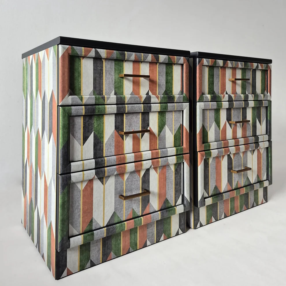 G-plan bedside tables with 3 drawers decorated with chevron pattern and copper handles