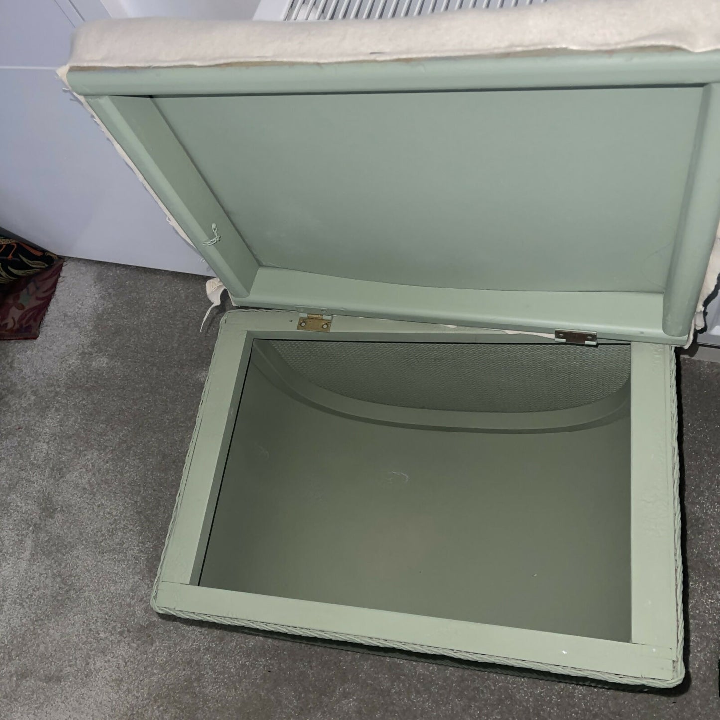 Small mid century Ottoman storage and seat. Sage green paint makes you choose the material.