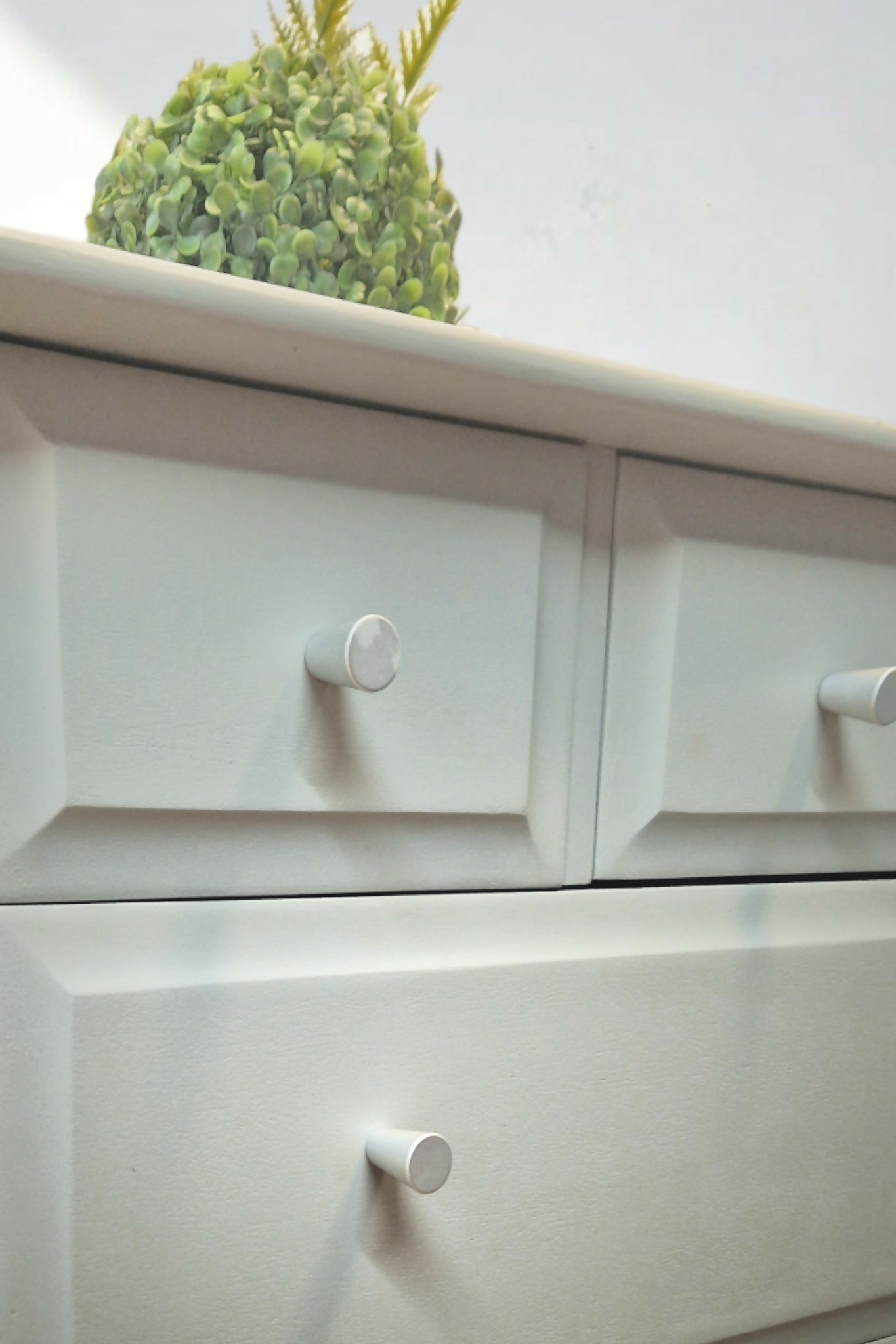 Stag Minstrel Chest of Drawers on Grey, Oversize bedside table