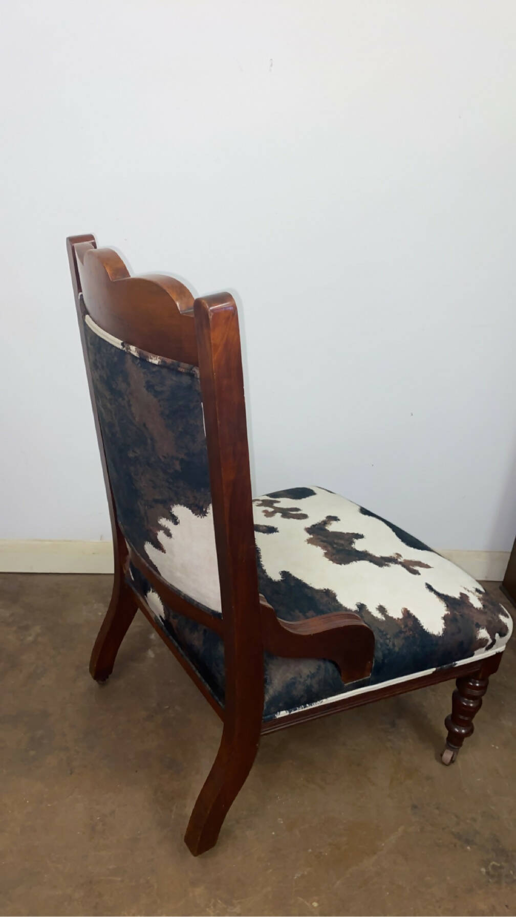 Reupholstered cowhide Victorian chair