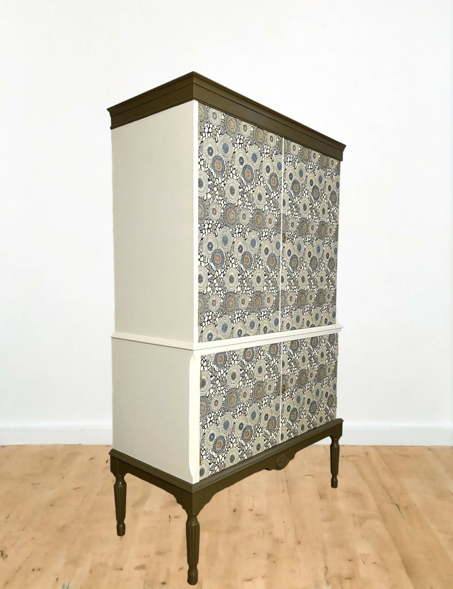 Unique drinks cabinet painted in green and cream