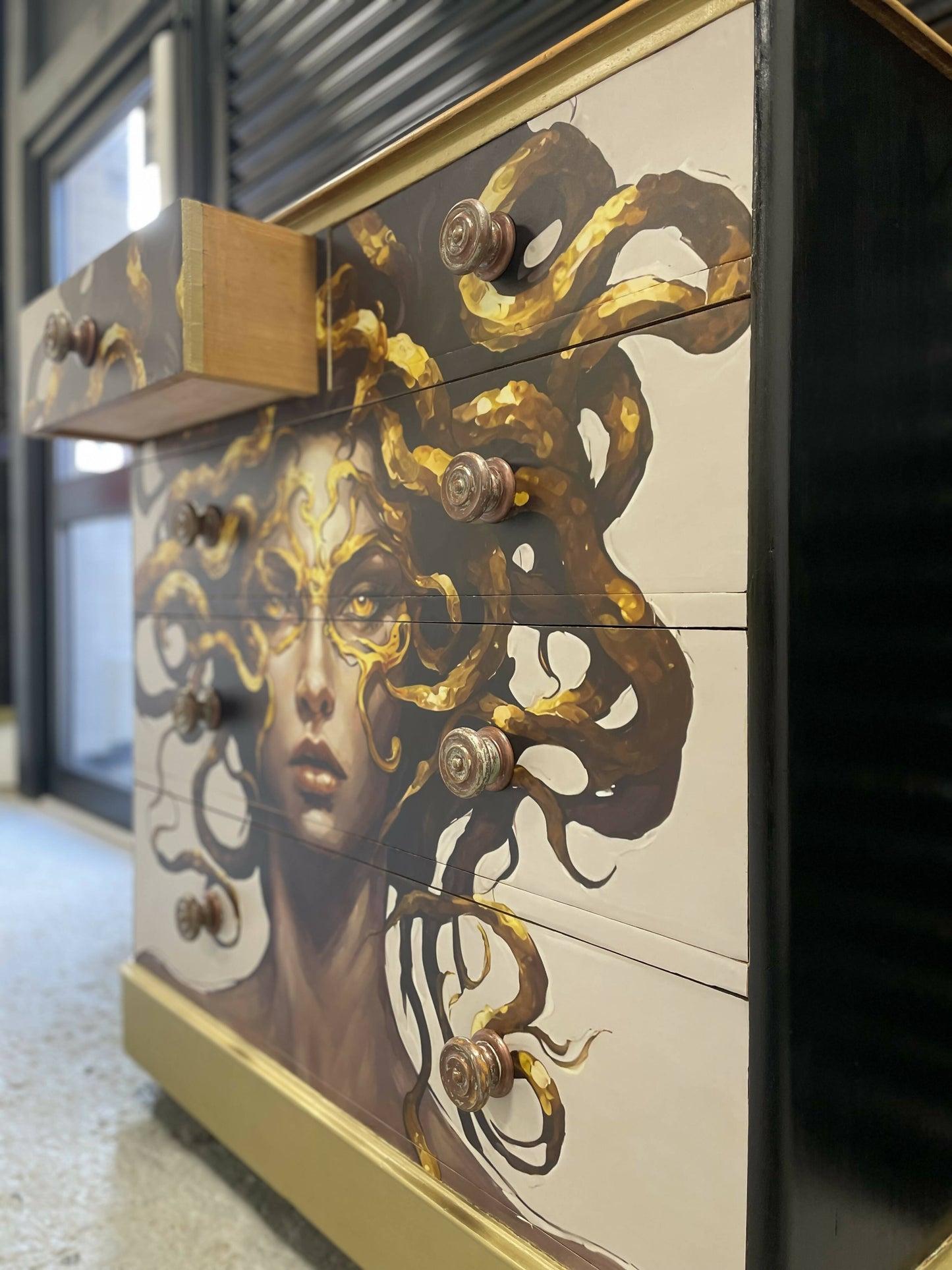 Magnificent Golden Medusa Mid-Century chest of four drawers