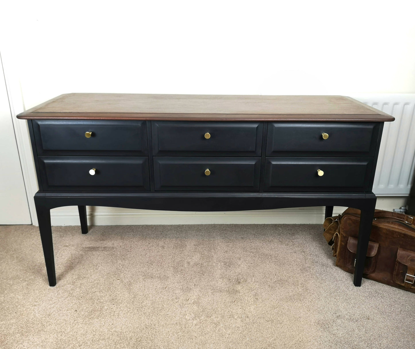 Stag Minstrel 6 drawer console table. Black with stripped & restored top with dark stain.